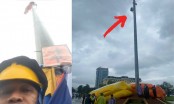 Clip: Người đàn ông livestream cảnh treo mình trên cột cờ, chuẩn bị 'đăng xuất'