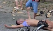 Nghệ An: Thanh niên nằm “giả chết” trên đường rồi bất ngờ dùng gạch tấn công khiến 2 người trọng thương