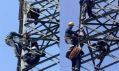 Mùng 4 Tết: Giải cứu người phụ nữ 63 tuổi vắt vẻo trên cột điện cao 25m