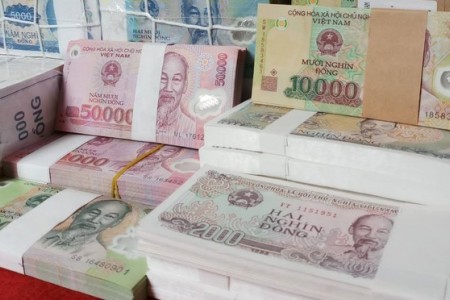 Không chỉ đổi tiền lẻ kiếm lời, hành vi in bao lì xì hình tiền Việt Nam cũng sẽ bị phạt nặng