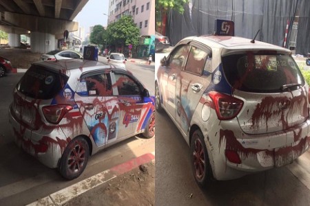 Hà Nội: Xe taxi ở Linh Đàm bị tạt sơn đỏ chằng chịt không rõ lý do